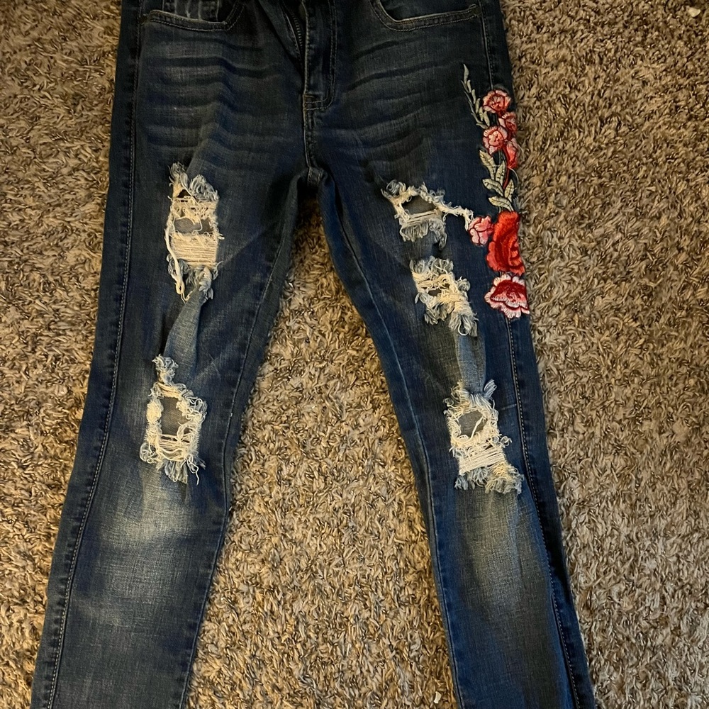 Rose embroidered ripped jeans. Like new